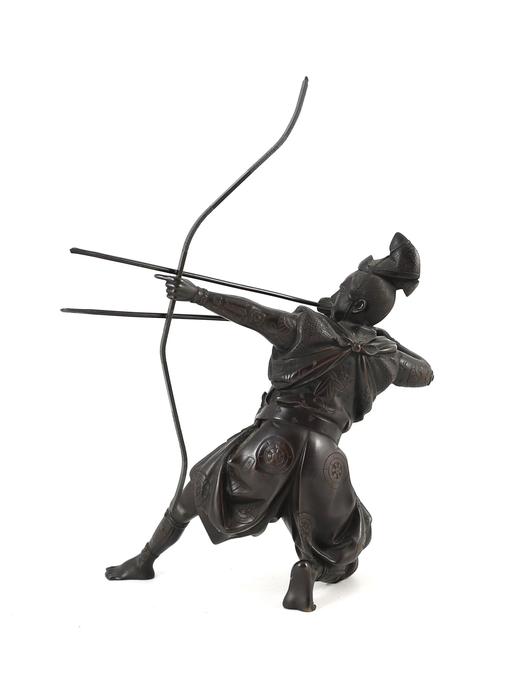 A Japanese bronze figure of a kneeling archer, Meiji period, 40 cm high